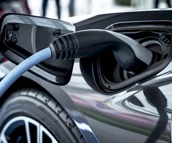 Electric car at charging station